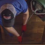 5d5eb910e396d11cc969efd3 Plumber Unclogging a Kitchen Drain 150x150