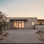custom home front with paver driveway 150x150
