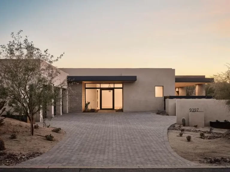 custom home front with paver driveway 768x576