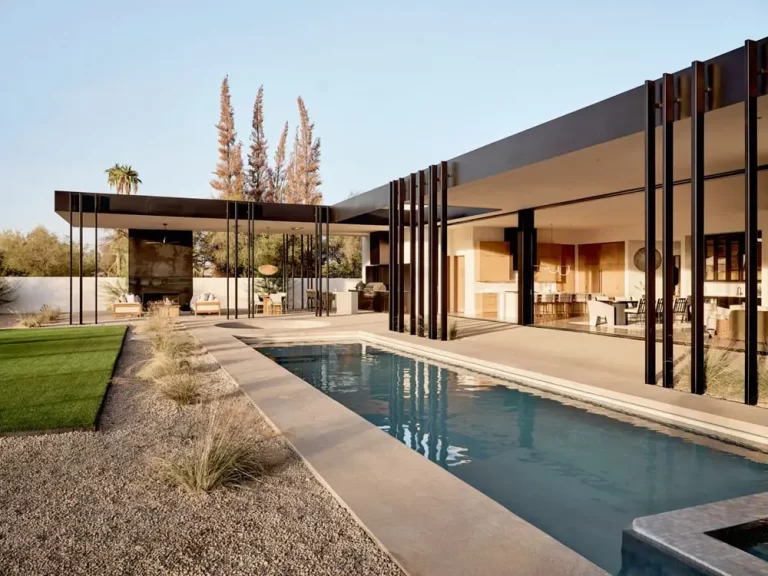 large patio full window wall backyard pool 768x576